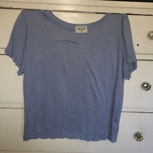 Blue, soft fabric, with curly at the end of sleeve